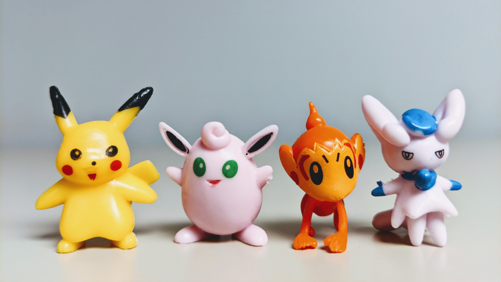 Four plastic Pokémon figures